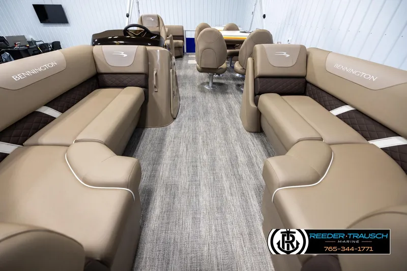 Slide: The Image of Interior of a 2025 Bennington 23 SXPDSE pontoon boat with luxurious seating. - 13