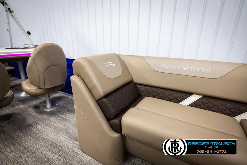 Slide: The Image of Luxurious interior of 2025 Bennington 23 SXPDSE pontoon boat with plush seating. - 21