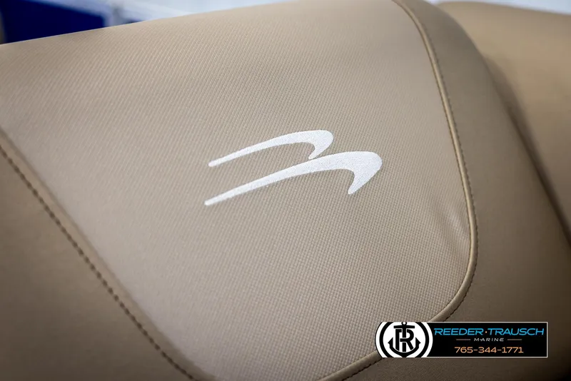 Slide: The Image of Beige upholstery with Bennington logo on 2025 23 SXPDSE boat seat. - 35