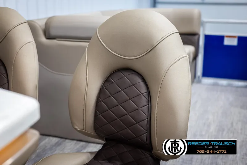 Slide: The Image of Luxurious seating in 2025 Bennington 23 SXPDSE boat, featuring elegant beige and brown upholstery. - 36