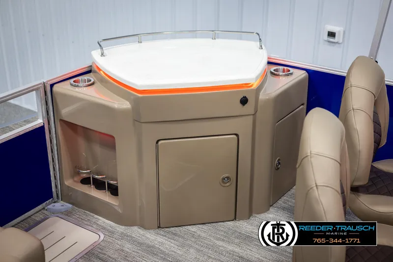 Slide: The Image of 2025 Bennington 23 SXPDSE boat interior with bar area and seating. - 37