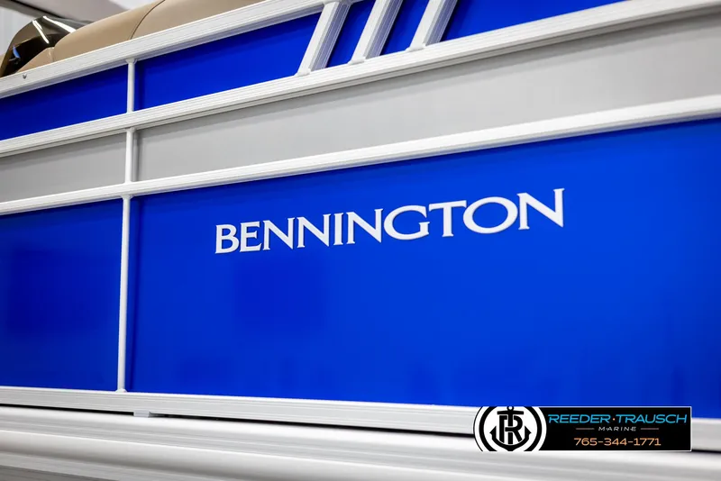 Slide: The Image of 2025 Bennington 23 SXPDSE boat with blue and white design. - 45
