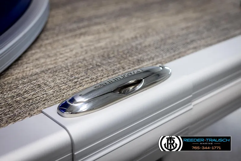 Slide: The Image of 2025 Bennington 23 SXPDSE boat detail with branded metal cleat and textured surface. - 48