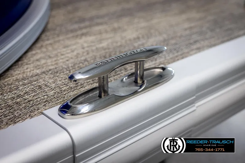 Slide: The Image of 2025 Bennington 23 SXPDSE boat cleat on textured deck surface. - 49