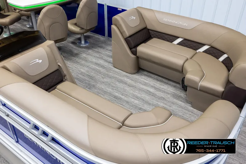 Slide: The Image of 2025 Bennington 23 SXPDSE pontoon boat interior with luxurious seating and modern design. - 9