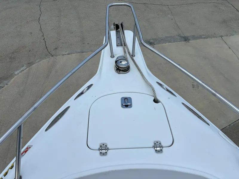 Slide: The Image of 2001 Donzi 26 ZF boat bow with anchor and rope. - 7