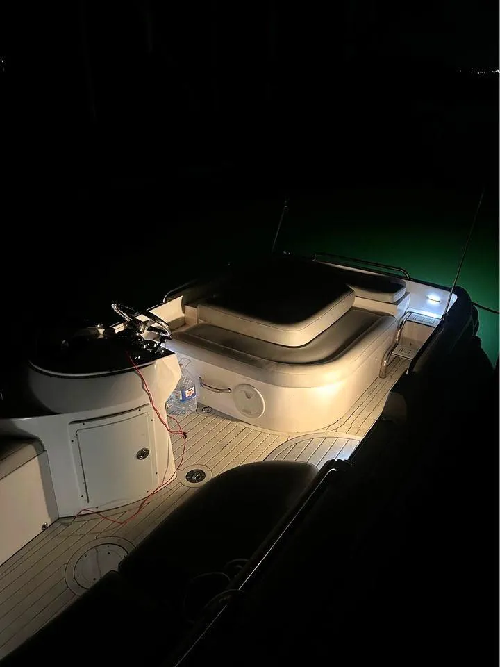 Slide: The Image of 2007 Novurania 6.0 Custom boat interior illuminated at night. - 4