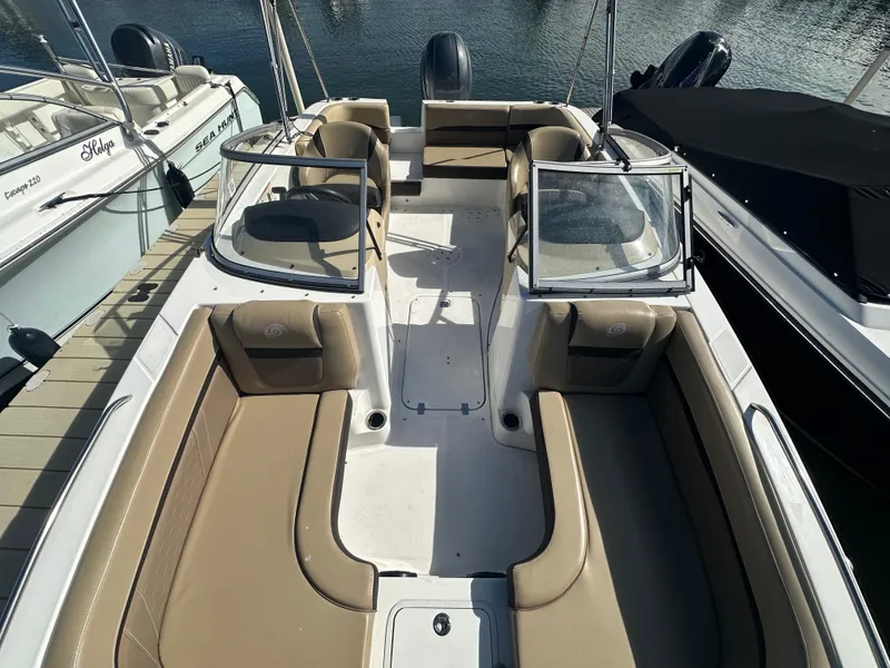 Slide: The Image of 2019 Hurricane SD191 boat interior with tan seating and dual consoles. - 5