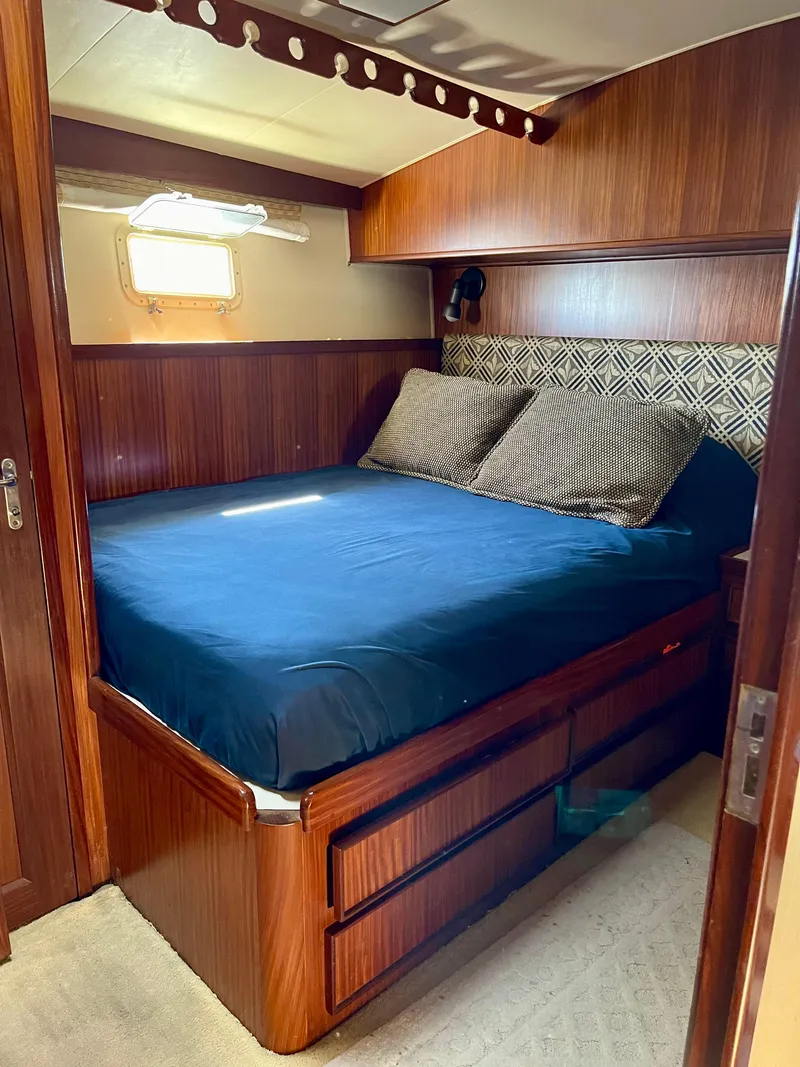 Slide: The Image of Master Stateroom view of Queen Bed - 25