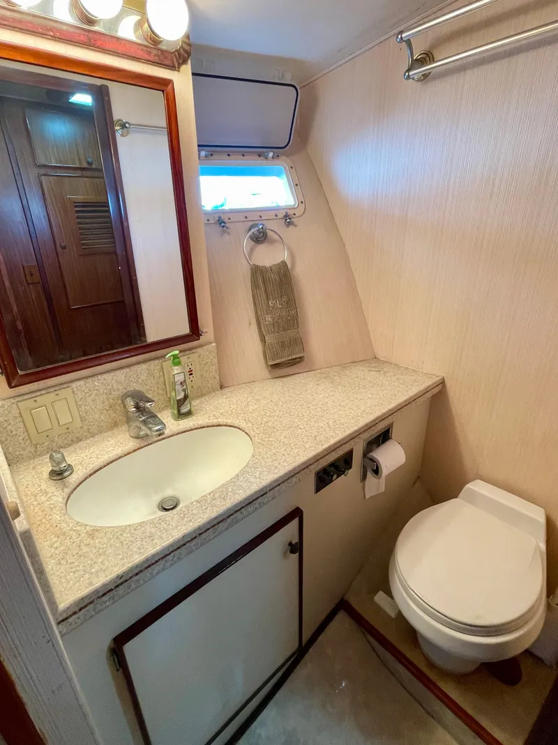 Slide: The Image of Ensuite Head shared by two guest cabins - 32