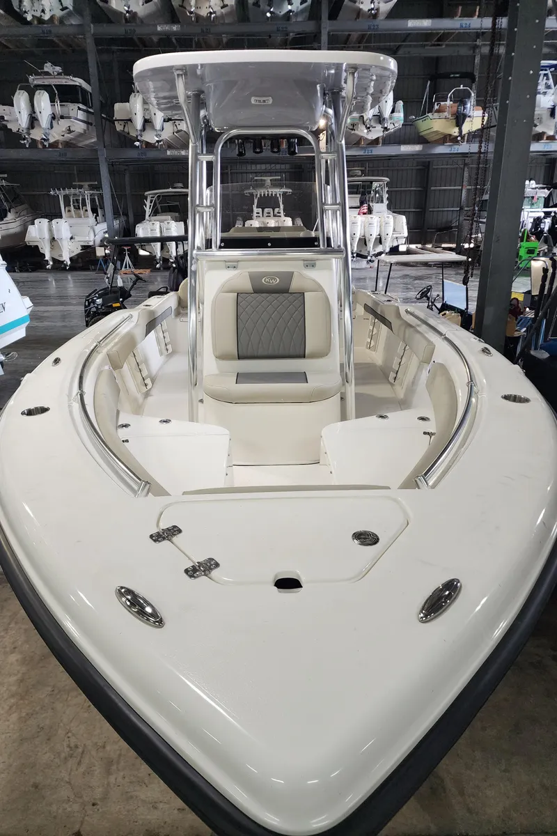 Slide: The Image of 2025 Key West 219 FS boat in showroom, front view. - 4