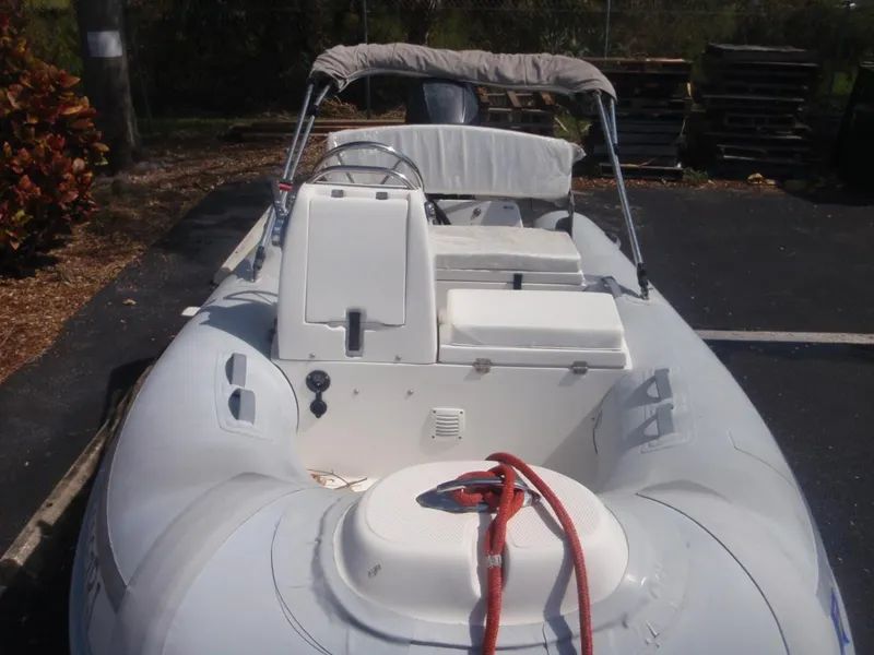 Slide: The Image of 2017 AB Inflatables Mares 10 VSX boat with seating and steering console. - 2