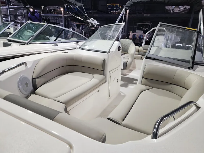 Slide: The Image of 2025 Key West 203 DFS boat interior with plush seating and modern design. - 11