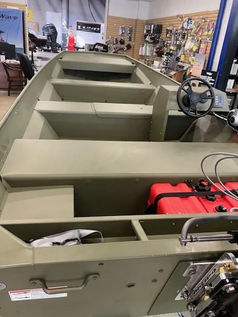 Slide: The Image of 2024 Lund 1852MT boat steering console with throttle control. - 7