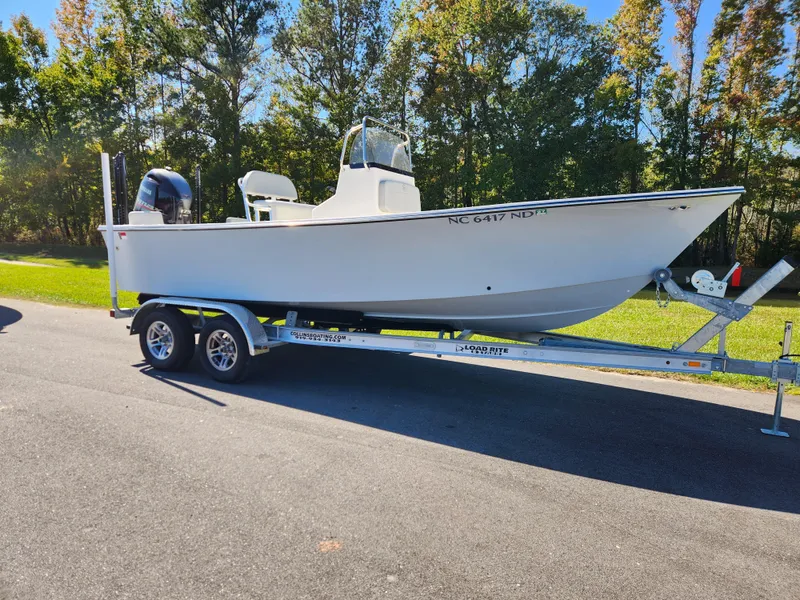 Slide: The Image of 2023 May-Craft 208 CC boat on trailer, parked outdoors. - 1