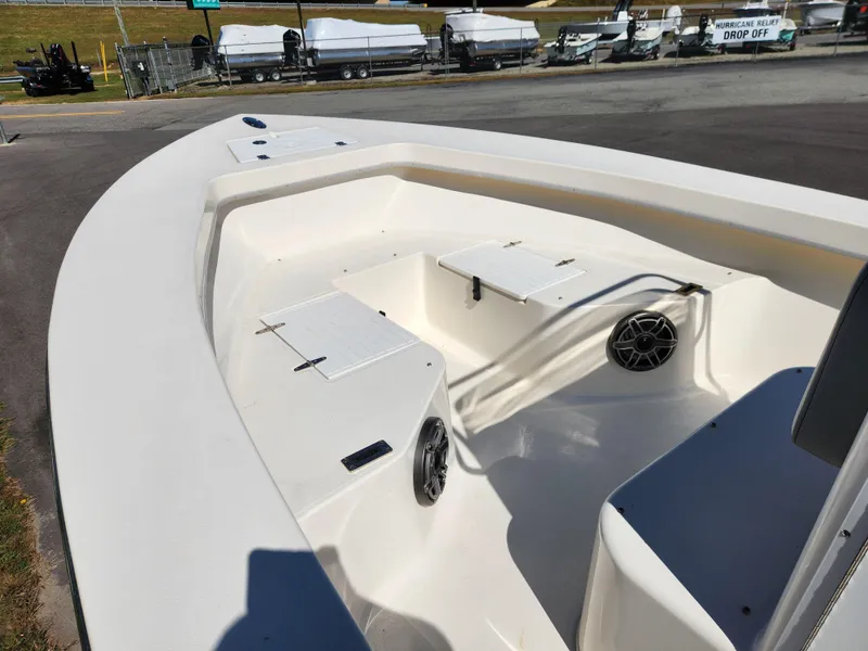 Slide: The Image of 2023 May-Craft 208 CC boat interior with seating and storage compartments. - 14