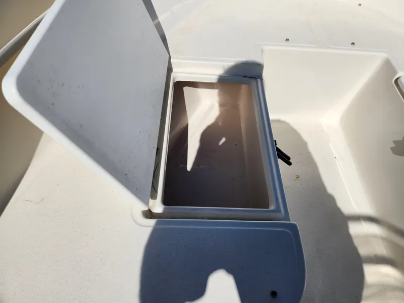 Slide: The Image of Open storage compartment on 2023 May-Craft 208 CC boat. - 15