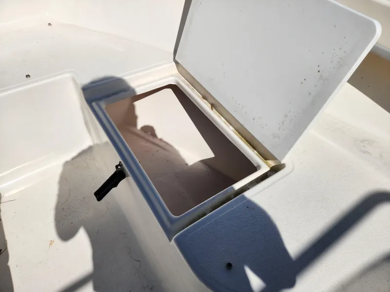 Slide: The Image of Open storage compartment on 2023 May-Craft 208 CC boat. - 16