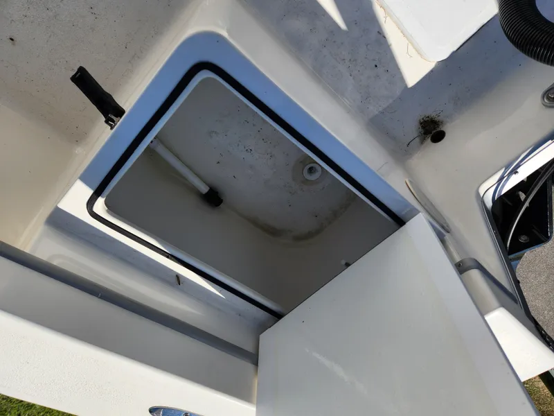 Slide: The Image of Open storage compartment on 2023 May-Craft 208 CC boat. - 19