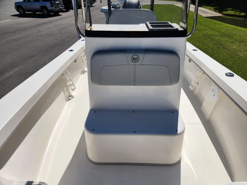 Slide: The Image of 2023 May-Craft 208 CC boat interior with seating and console. - 9