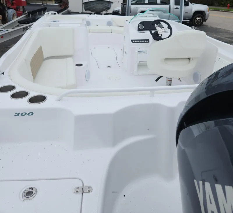 Slide: The Image of 2025 SouthWind 200 SD boat interior with Yamaha engine, featuring spacious seating and modern controls. - 4