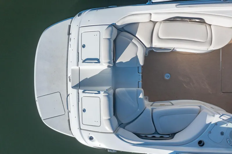 Slide: The Image of Top view of 2006 Crownline 270 BR boat interior with white seating. - 10