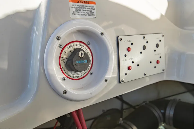 Slide: The Image of Close-up of 2006 Crownline 270 BR boat control panel and battery switch. - 28