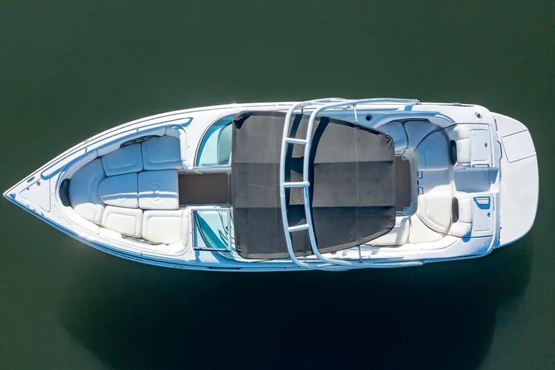 Slide: The Image of Aerial view of 2006 Crownline 270 BR boat on calm water. - 6
