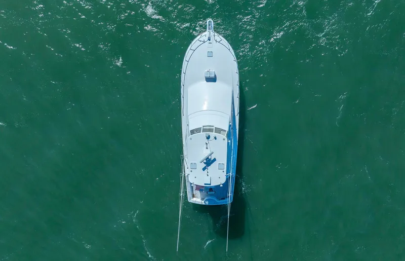 Slide: The Image of Aerial view of 2005 Ocean Yachts 50 Super Sport on green water. - 2