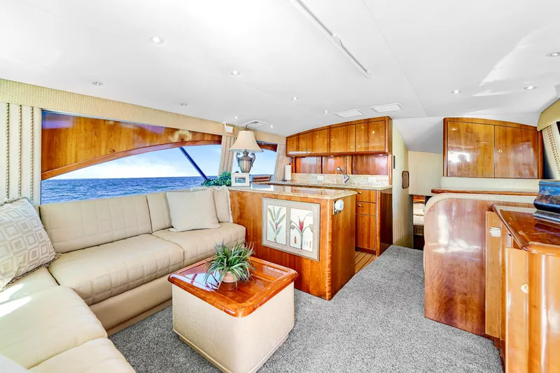 Slide: The Image of Luxurious interior of 2005 Ocean Yachts 50 Super Sport with elegant wood finishes. - 23