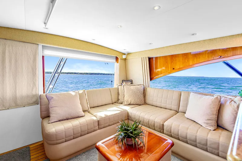 Slide: The Image of Luxurious interior of 2005 Ocean Yachts 50 Super Sport with ocean view and plush seating. - 24