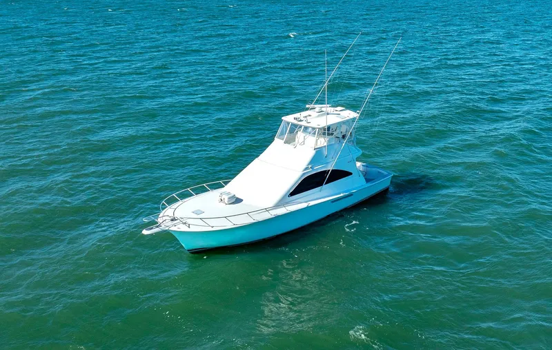 Slide: The Image of 2005 Ocean Yachts 50 Super Sport on open water, showcasing sleek design and elegance. - 3