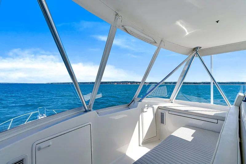 Slide: The Image of 2005 Ocean Yachts 50 Super Sport interior with ocean view, featuring sleek design and comfortable seating. - 40