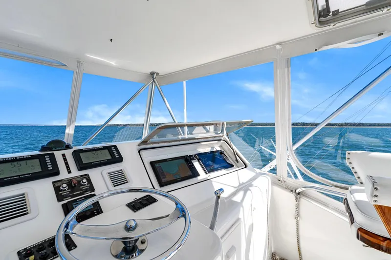 Slide: The Image of 2005 Ocean Yachts 50 Super Sport helm with ocean view and navigational instruments. - 41