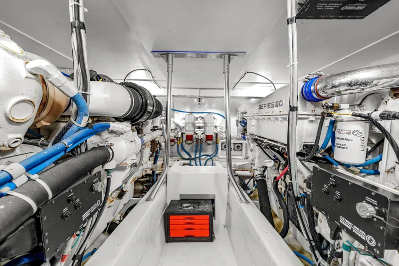 Slide: The Image of Engine room of 2005 Ocean Yachts 50 Super Sport, showcasing mechanical components and systems. - 43