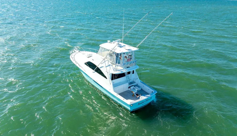 Slide: The Image of 2005 Ocean Yachts 50 Super Sport cruising on open water. - 5