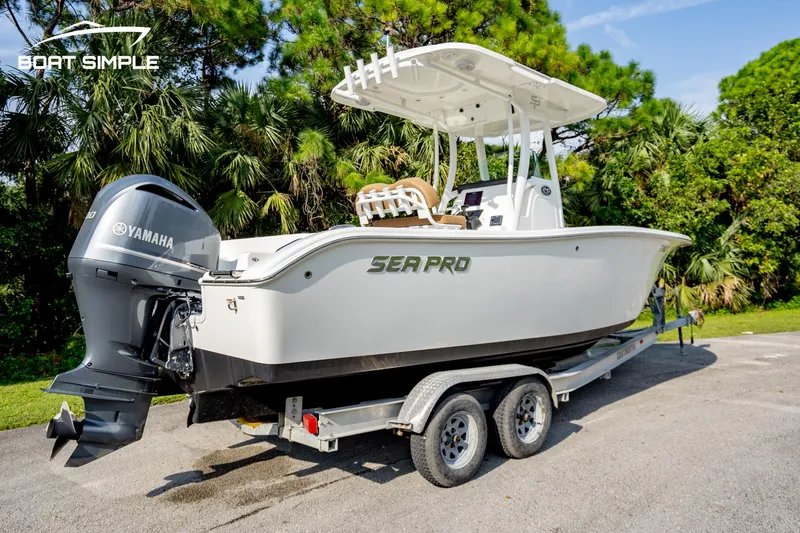 Slide: The Image of 2024 Sea Pro 239 Deep V CC boat on trailer, featuring Yamaha outboard motor. - 3