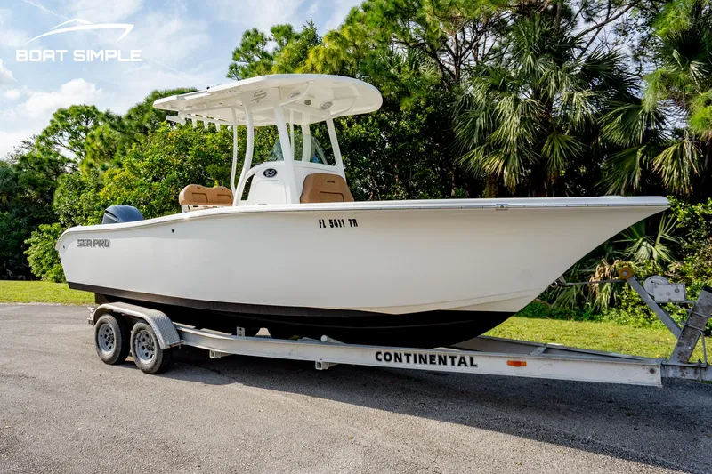 Slide: The Image of 2024 Sea Pro 239 Deep V CC boat on trailer, parked outdoors. - 4