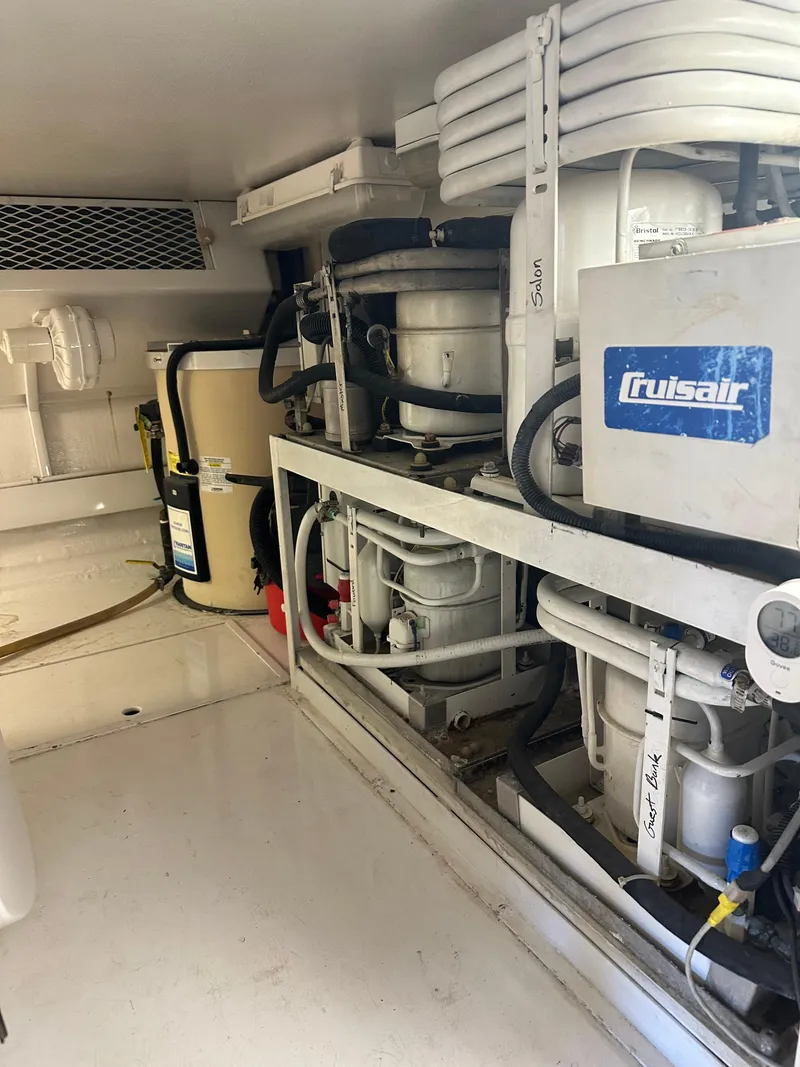 Slide: The Image of Engine room of 1999 Viking 55 Convertible yacht with Cruisair system. - 24