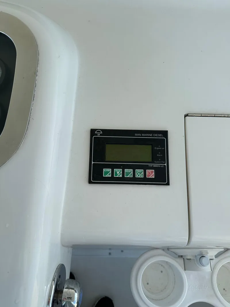 Slide: The Image of Control panel on 1999 Viking 55 Convertible yacht dashboard. - 31