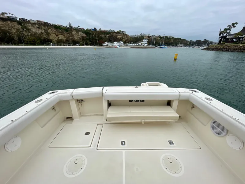 Slide: The Image of 1998 Tiara Yachts 3100 Open boat deck with scenic harbor view. - 10
