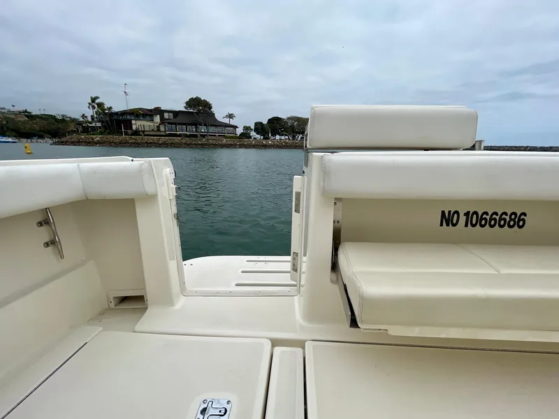 Slide: The Image of 1998 Tiara Yachts 3100 Open boat interior with water view. - 27