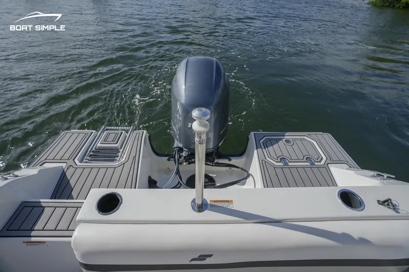 Slide: The Image of 2023 Starcraft SVX 191 OB boat stern with outboard motor on water. - 8