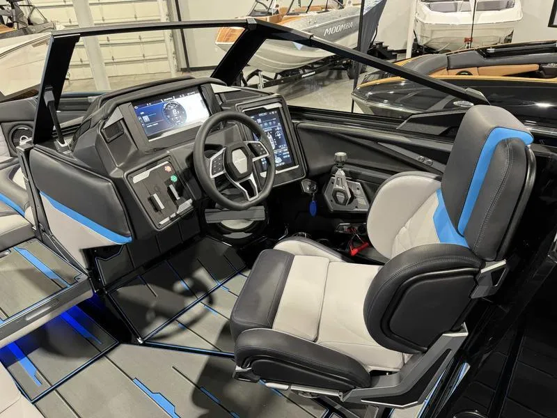 Slide: The Image of 2025 Supra SA boat interior with modern dashboard and comfortable seating. - 11