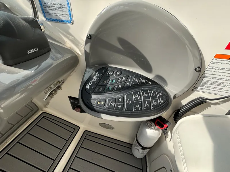 Slide: The Image of Control panel of 2005 Cruisers Yachts 440 Express with safety equipment visible. - 17