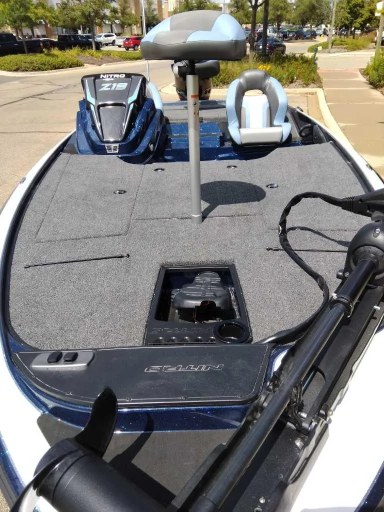 Slide: The Image of 2025 Nitro Z19 fishing boat with spacious deck and seating. - 2