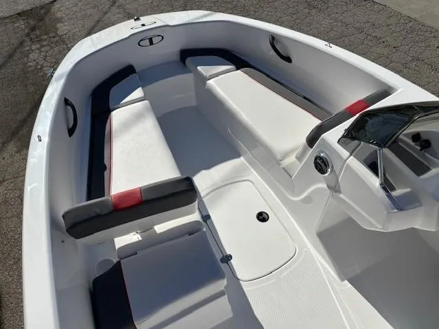 Slide: The Image of 2025 Tahoe T16 boat interior with white and red seating, modern design. - 6
