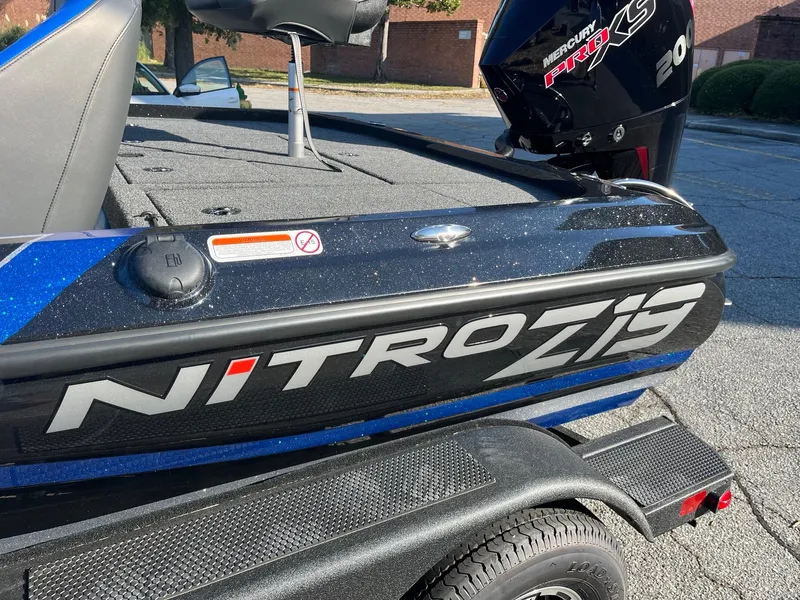 Slide: The Image of 2025 Nitro Z19 boat with Mercury engine on a trailer. - 3