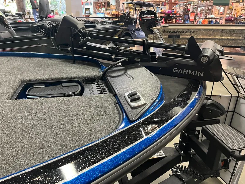 Slide: The Image of 2025 Nitro Z19 boat with Garmin equipment in a showroom. - 9