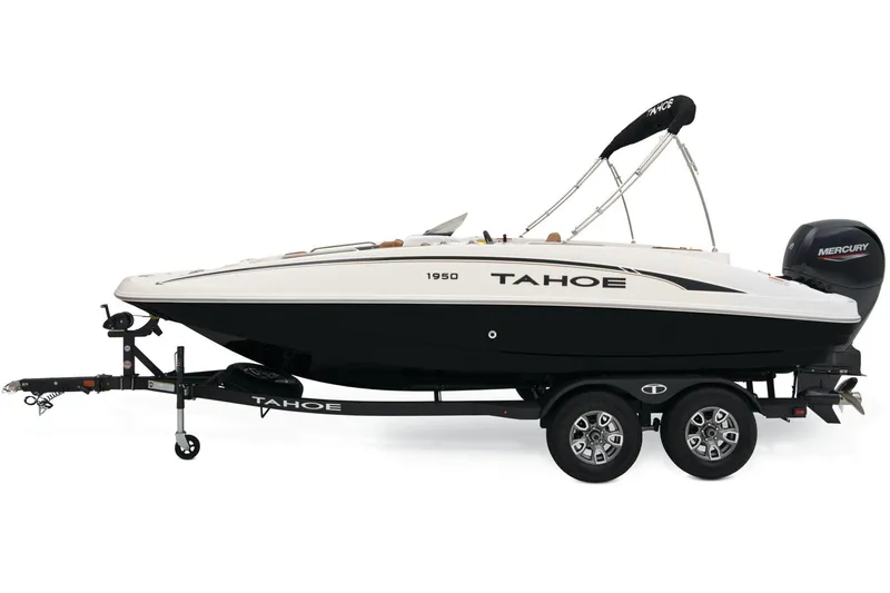 Slide: The Image of Interior of 2025 Tahoe 1950 boat, featuring steering wheel and brown seating. - 5